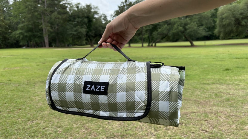 camping blanket - we wouldn't recommend cuddling up in the zaze, but it works well as...