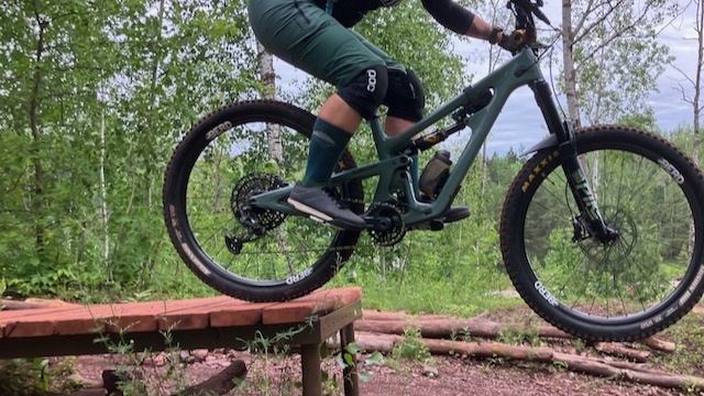 mountain bike flat pedals - high impact drops and jumps test a pedal's grip and traction.