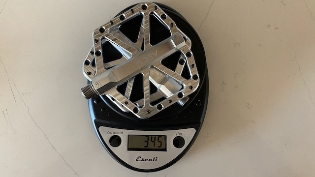 mountain bike flat pedals - each set of pedals is measured on a kitchen scale, and their weight...