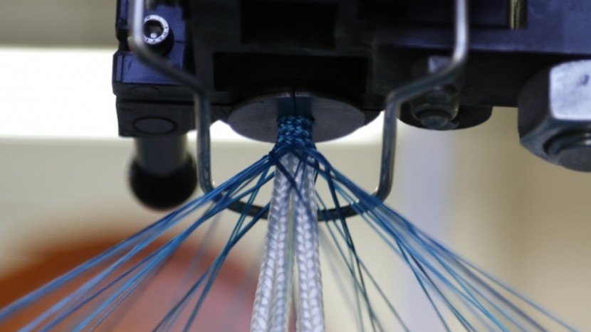 climbing rope - the white core of the rope is composed of shrunken, braided, and...