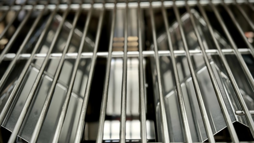 portable grill - two separate burners combine to produce 20,000 btus within the...