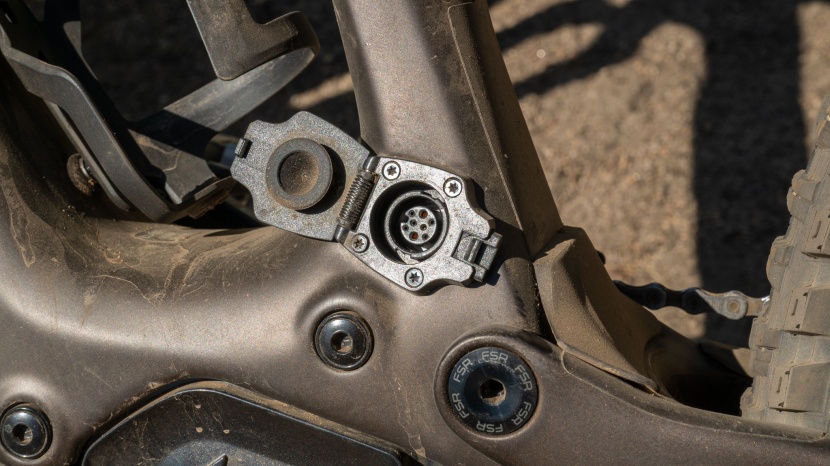 electric mountain bike - the charge port doubles as an input for the range extender battery.