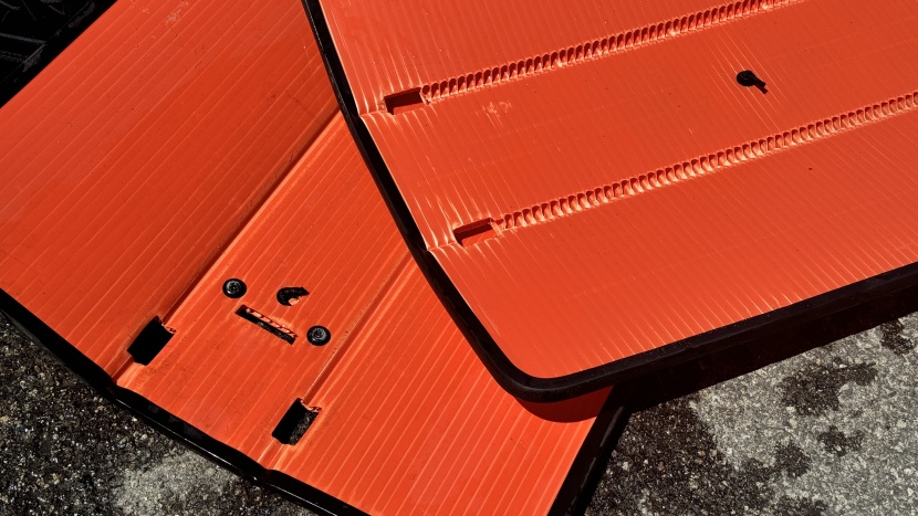 the orange plate that goes under the beach seat was updated in 2024...