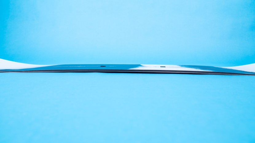 camber can be seen by its rise in the snowboard between the tip and...