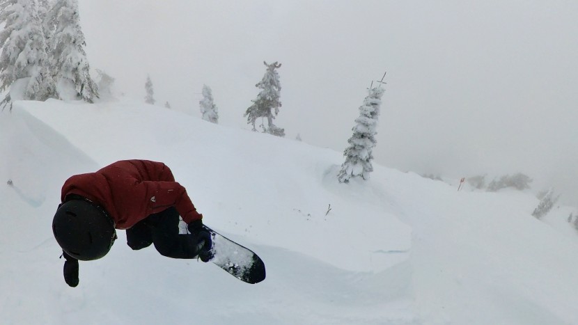 jones stratos - enjoying the easy pop of this board with a small air off of a cornice.
