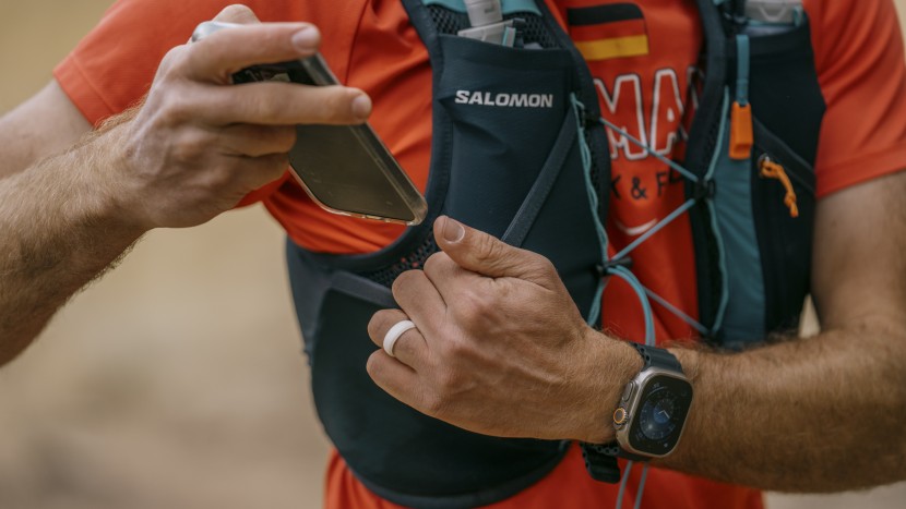 hydration pack for running men - easy-access phone pockets are important to many runners for checking...