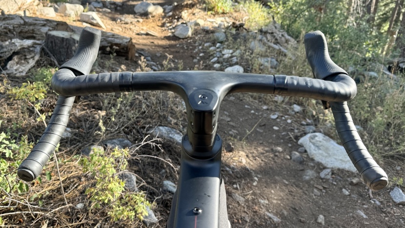 gravel bike - wide, flared drops help you traingulate your upper body mass behind...