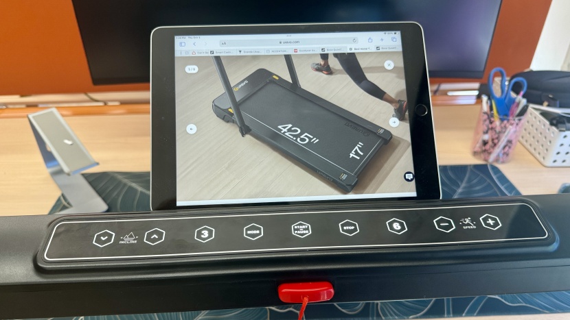 urevo strol 1 pro foldable treadmill - the device shelf can easily hold a full-sized ipad and doesn't...