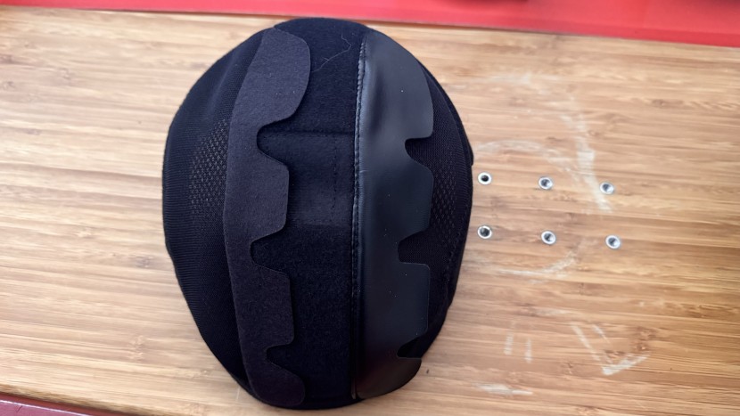 ski helmet - the pret cynix x2 ventilation system with one flap engaged and one...