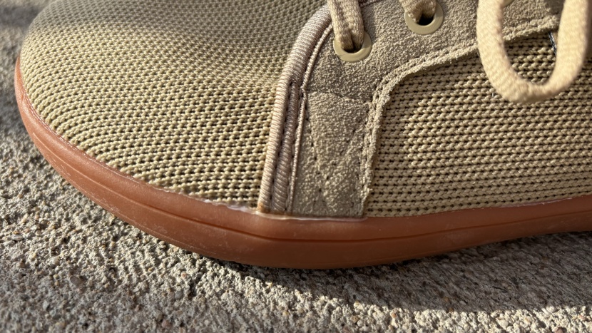 whitin minimalist for women - the exposed glue around the outsole gives us longevity concerns.