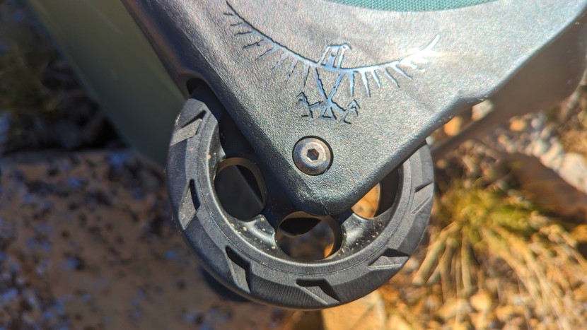 osprey sojourn shuttle 100l - inspecting our sojourn's massive wheels after we threw it down a...