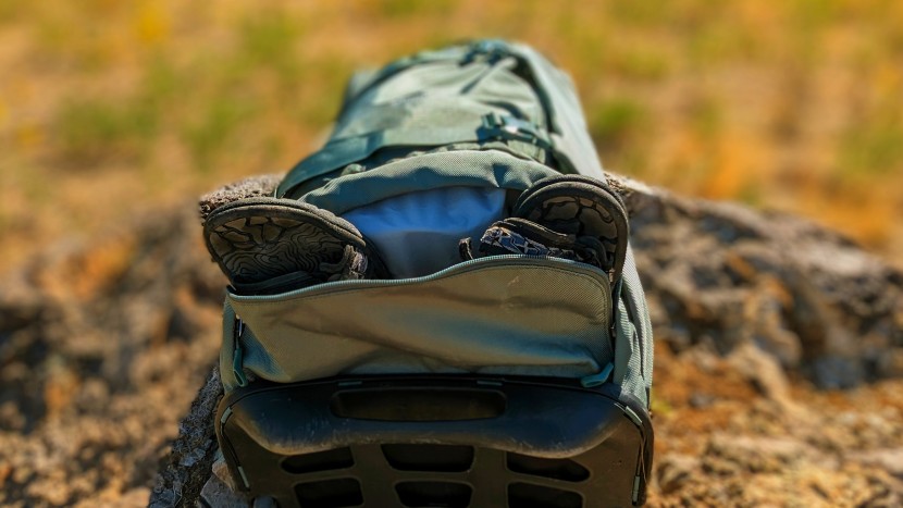 osprey sojourn shuttle 100l - we loved using the bottom pocket to stash things (like muddy shoes)...