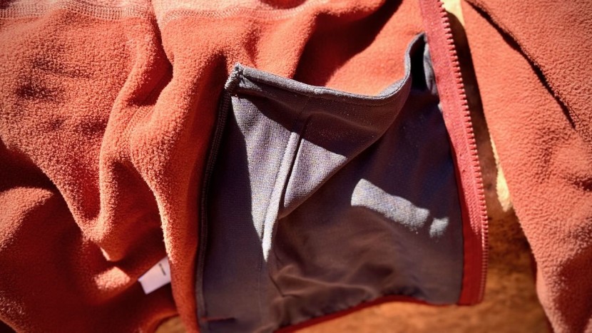 the trailmade features zippered pockets on the exterior that also...