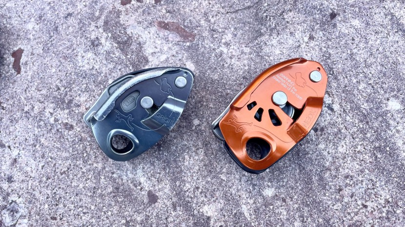the petzl grigri (left) is smaller and lighter than the petzl neox...