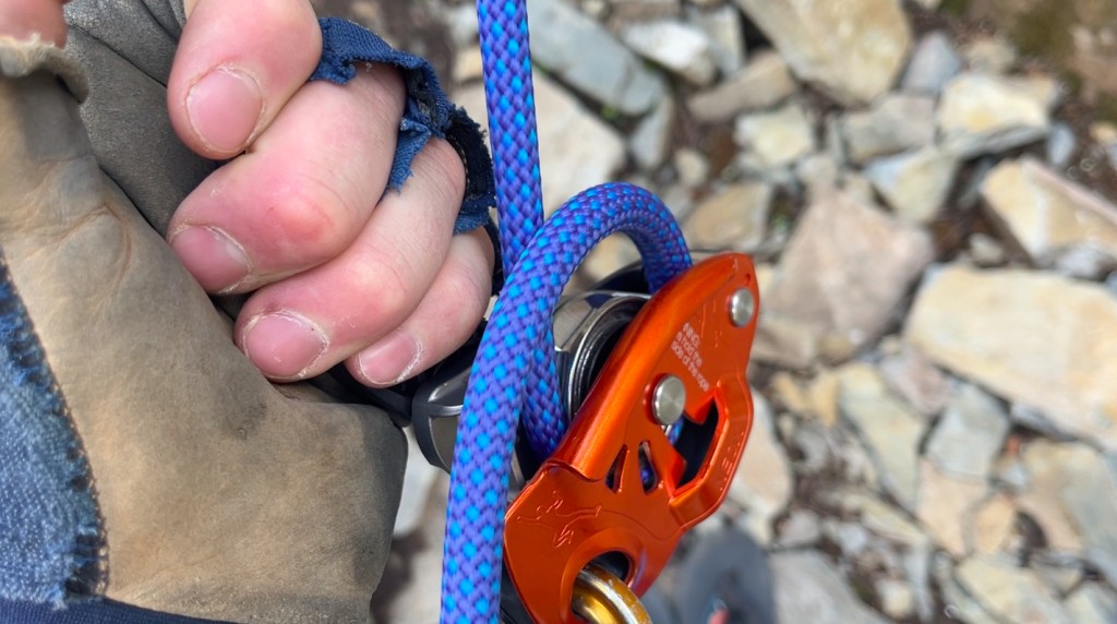petzl neox - the petzl neox in action while lowering.