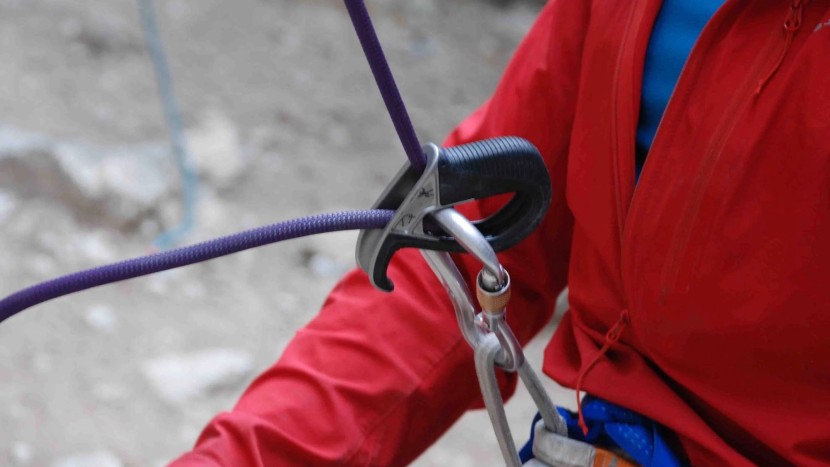 belay device - a passive device has no moving parts other than the device itself...