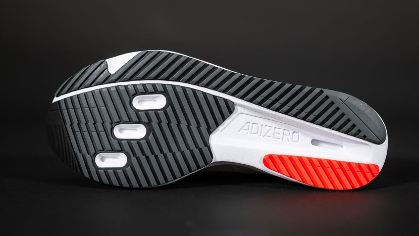 the adizero sl2 are pretty grippy for a shoe with no lugs and...