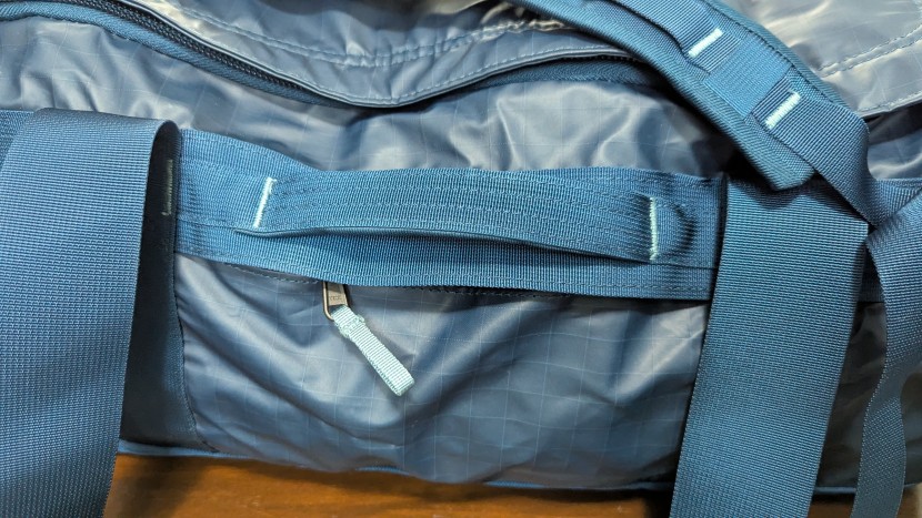 the north face base camp voyager duffel - there's a grab handle on each side of the bag, they're lightly...