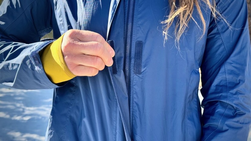 the jacket does not feature watertight zippers but rather a storm...