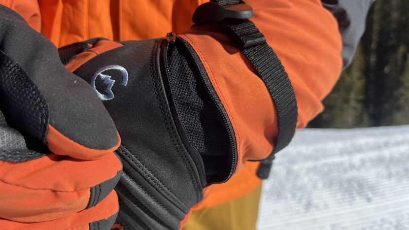 handwarmer pockets on the back of the palm help the user add even...