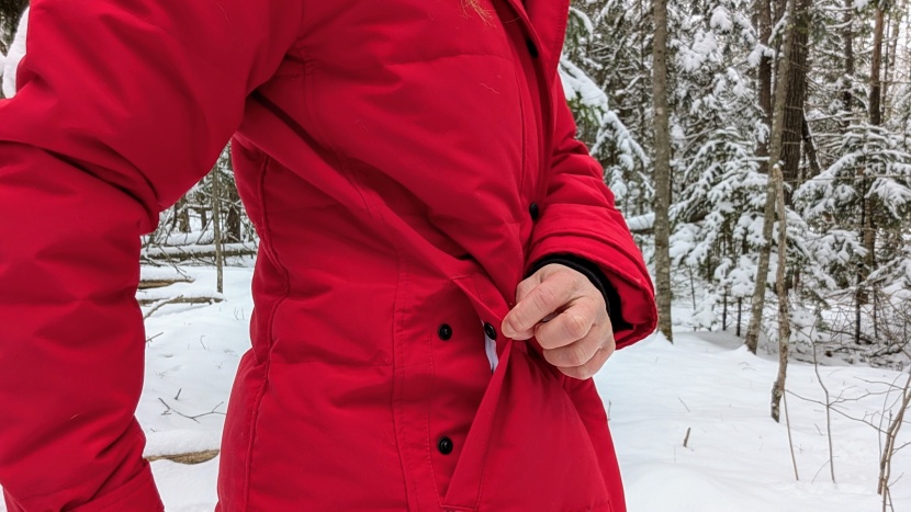 the hand-warming pockets close with snaps but are placed a bit too...