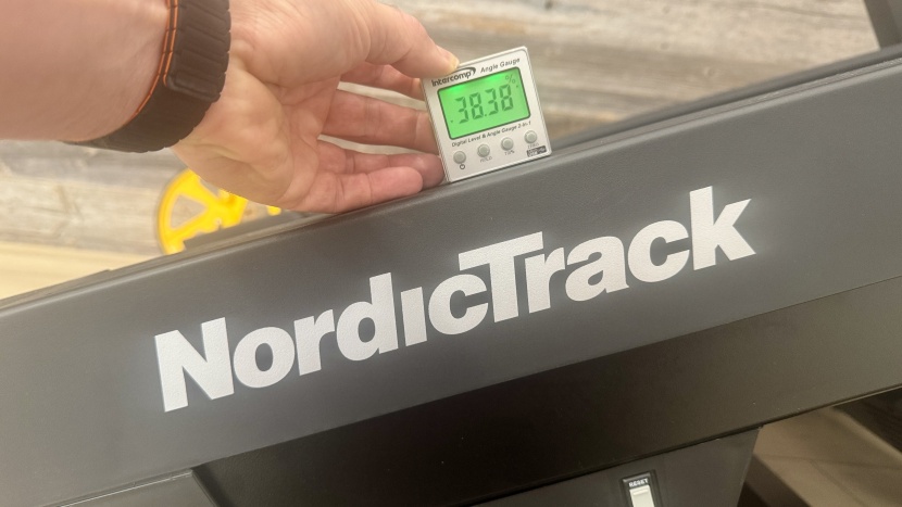 measuring the maximum incline; this is a difficult grade to run.