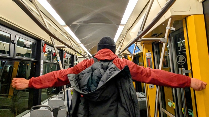 riding the rails in latvia with our langford secured to our back...