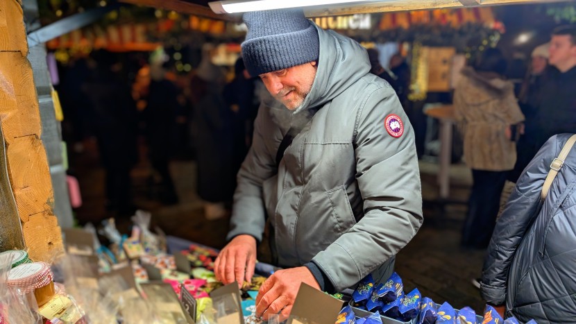making a stop at one of the many local booths in the riga, latvia...