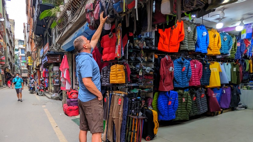 hiking shorts - shopping day packs at a local gear shop in kathmandu, nepal. the...