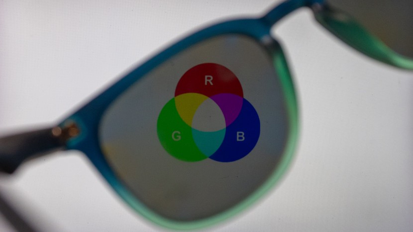 gray-tinted lenses equally block visible light regardless of color.