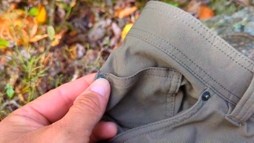 metal rivets reinforce the brion ii's front pockets.