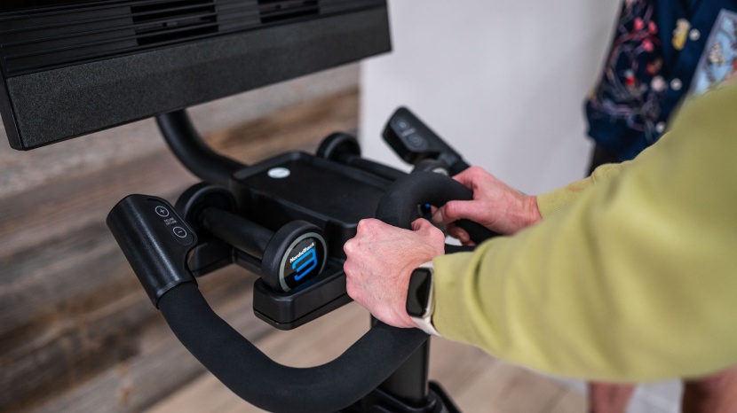 exercise bike - using bar-mounted controls offers an ergonomic solution to changing...
