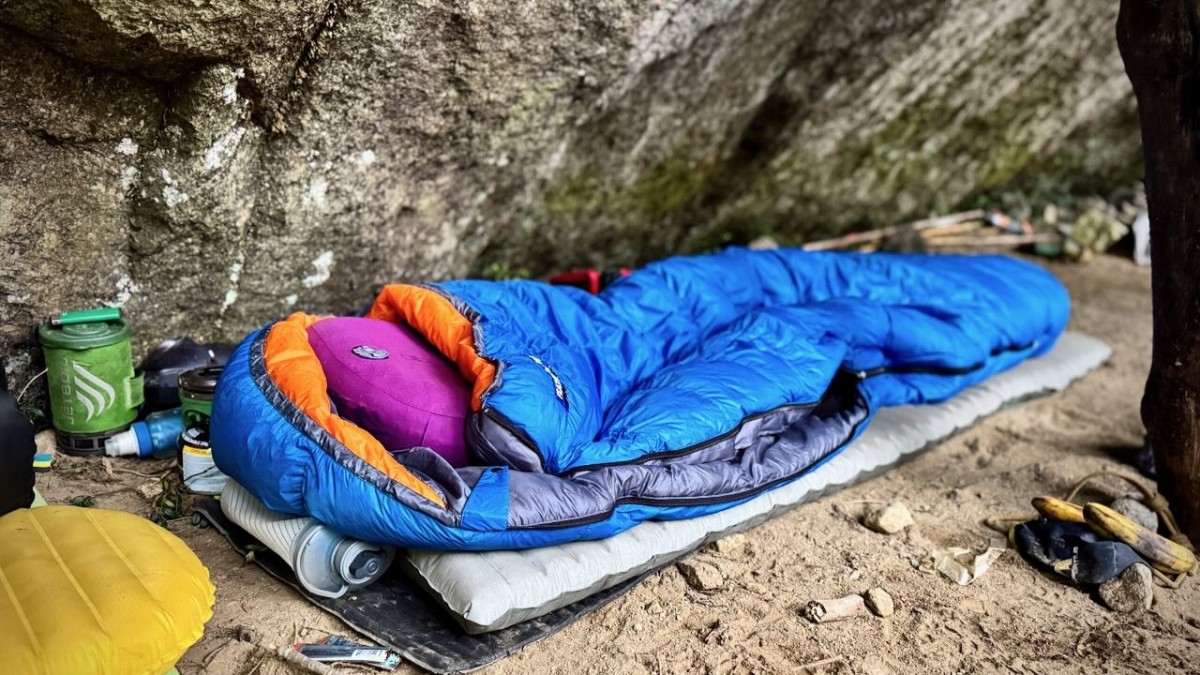 Feathered Friends Egret UL 20 - Women's Review (The shallow hood is pictured in this photo taken at one of the upper bivy caves that provided shelter from the rain.)