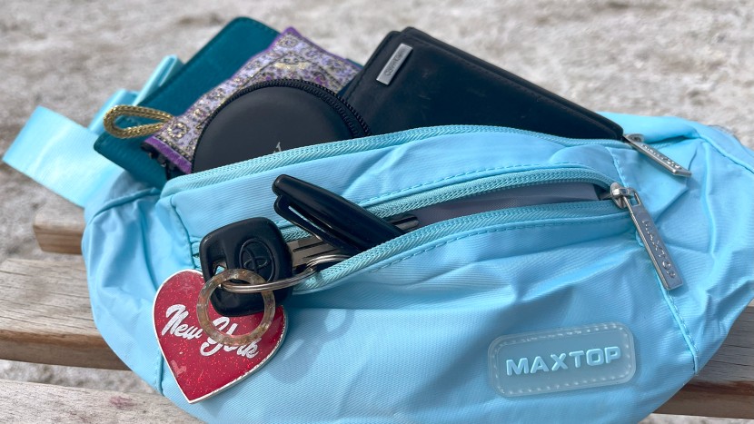 sling bag - the maxtop crossbody can fit a surprising amount, though we might...