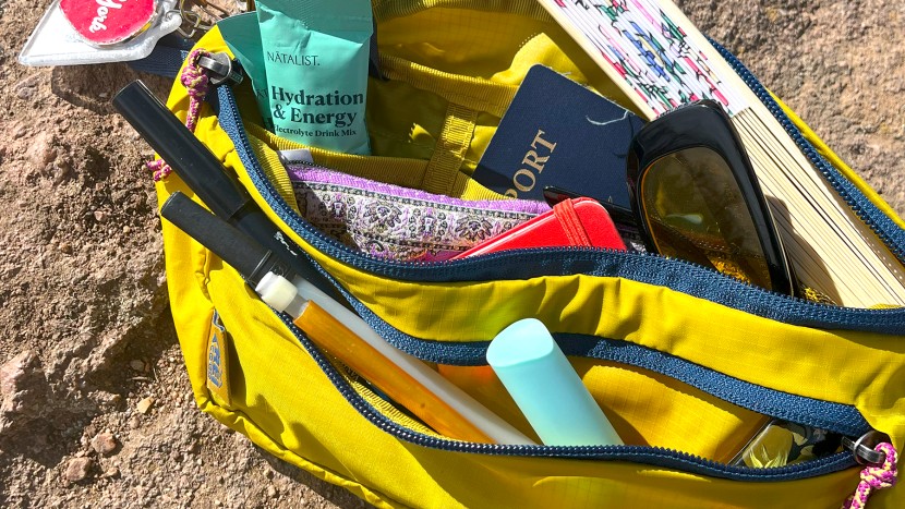 fanny pack - truly a gem, the rei co-op trail 2 waist holds everything you need.