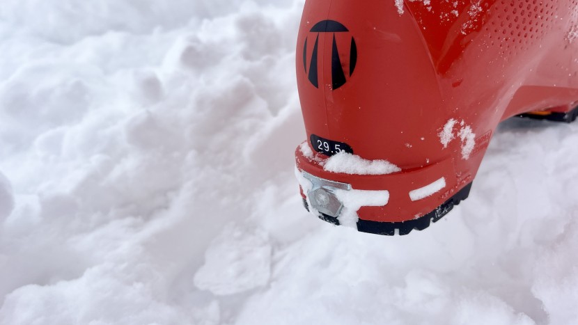 a close-up of the rear tech binding insert that locks the heel to...