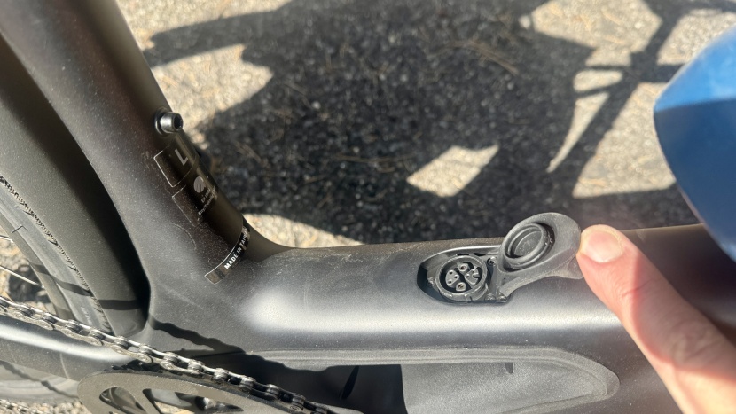 trek fx+7s - the charging port is relatively easy to access and uses a rubber...