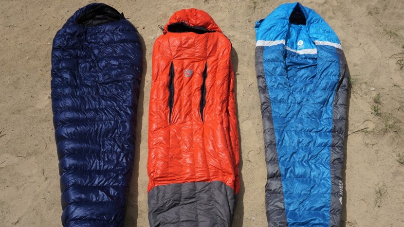 backpacking sleeping bag - on the left is an example of a traditional mummy bag. in center is...