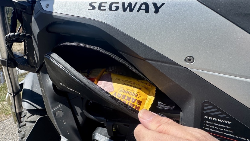 this clever accessory bag makes good use of the void in the xyber's...