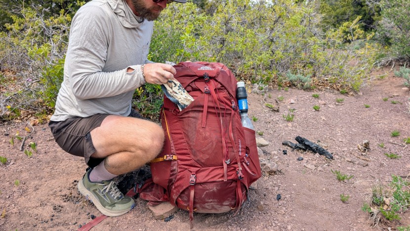 the paragon 60 has a stretch mesh front pocket for gear you want to...