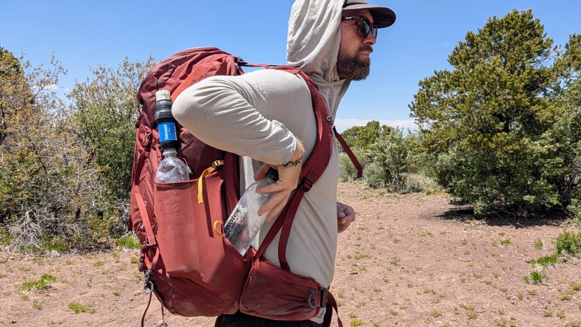 testing water bottle pocket accessibility in utah's la sal mountains.