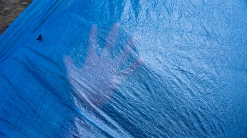 ultralight tent - the thin, .55 oz/sqyd dyneema fly material used on the zpacks...