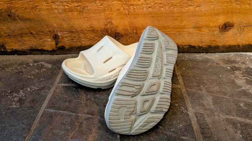 hoka ora recovery slide 3 - engineered with lightweight eva and precision-placed outsole...