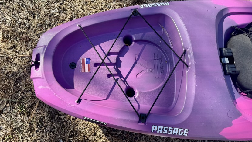 quest passage 100 - there is a large rear storage area with bungees and a cutout for a...