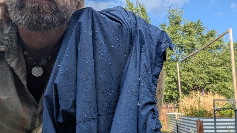 wind breaker jacket - the rab vital hoody's dwr coating causes water to bead up on the...