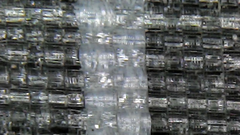 magnified under a microscope, the extremely lightweight 10d sil-sil...