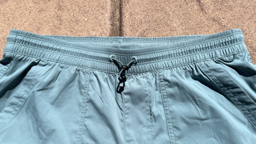 a closer look at the waistband, notably the integrated drawcord with...