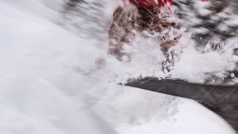 snowboard womens - popping through pow on the rome ravine pro