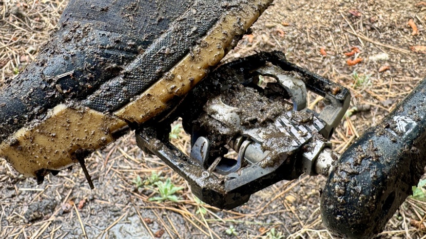 shimano xtr m9220 pedal - while not impervious to the mud, this is a solid all-weather pedal.