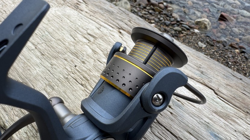 fishing reel - the pflueger president features rubbery columns on its spool, making...
